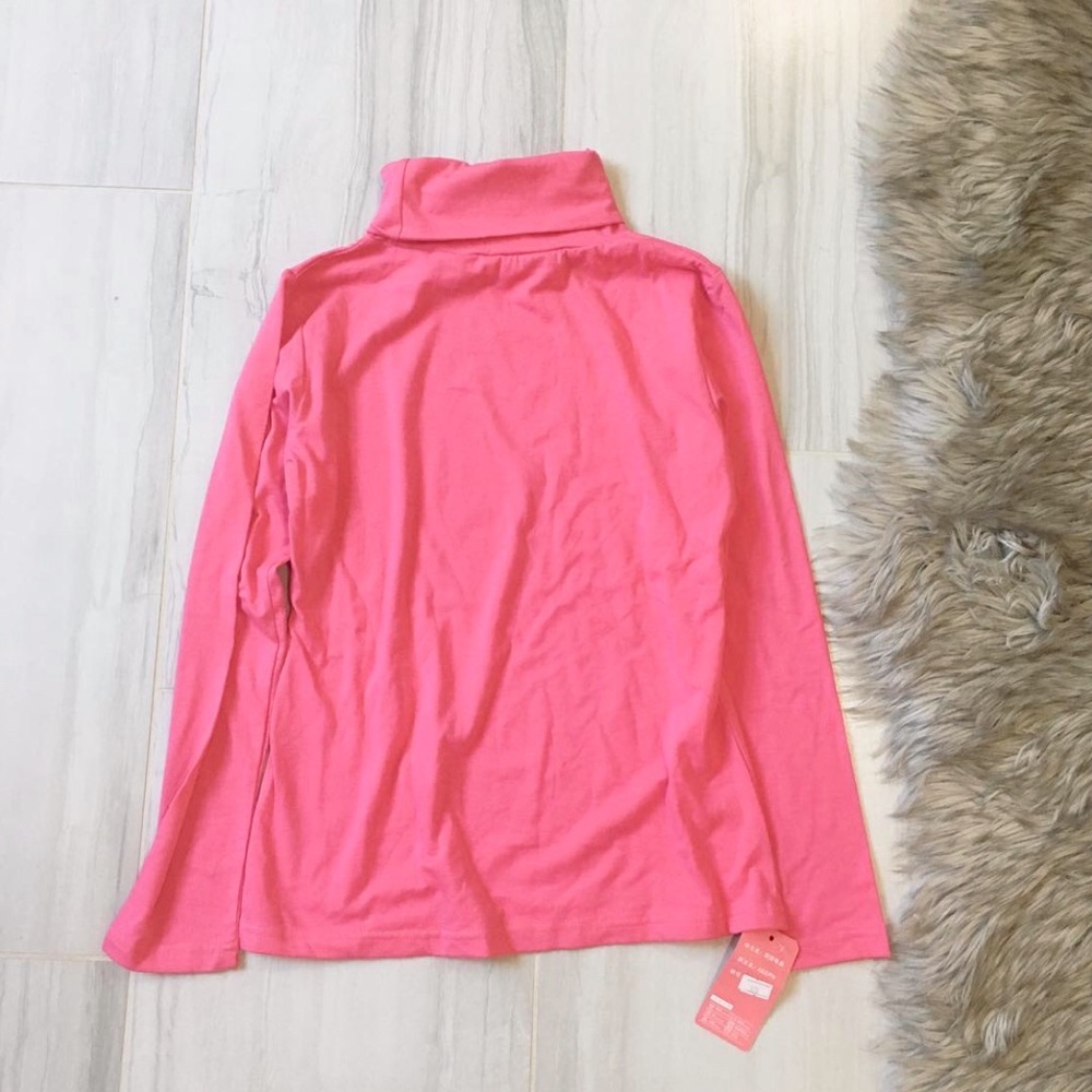 Pink long sleeve turtleneck top